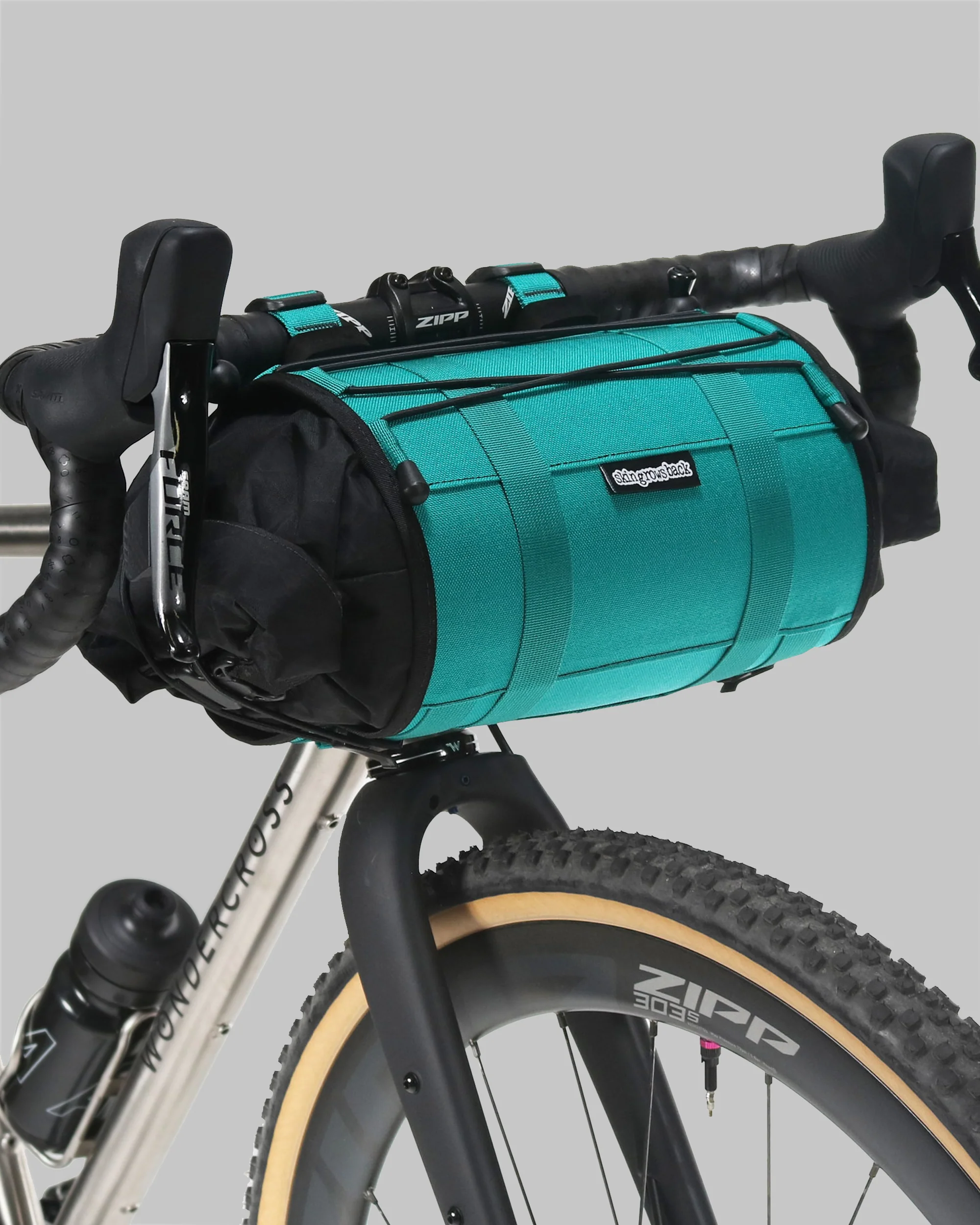 SKIN GROWS BACK Overnighter Handlebar Bag 11L